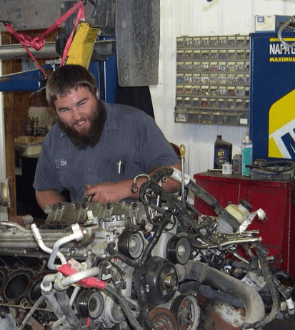 Mevert Automotive technician doing repair