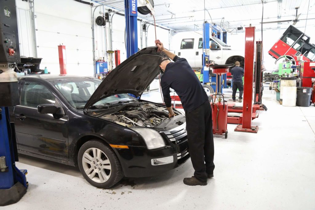 A car being looked over as part of preventative maintenance, byA Mevert Automotive technician