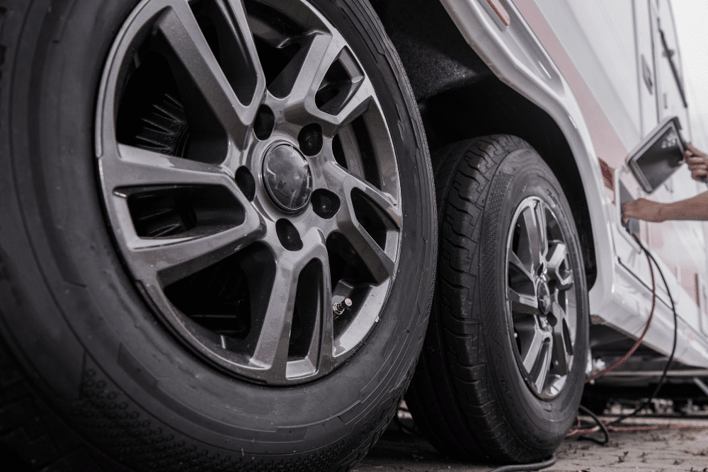 rv tire maintenance, auto repair in Steeleville, IL at Mevert Automotive & Tire Center. Close-up of vehicle tires and rims of an RV during a routine maintenance check.