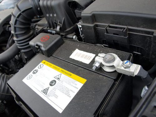 A battery inside a car, brought into Mevert Automotive. We take care of an electrical problems your car may have.